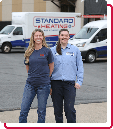 technician smiling through company van window