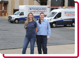 technician smiling through company van window